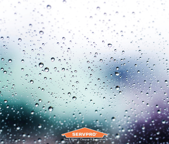 Water droplets with SERVPRO logo 