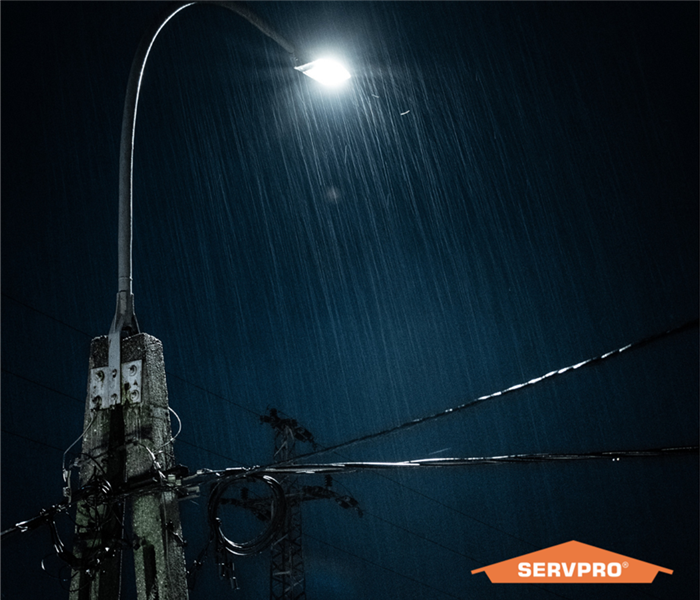 Outdoor lamp in storm with logo